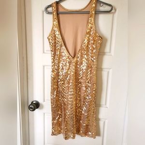 Plunging neckline gold sequin dress